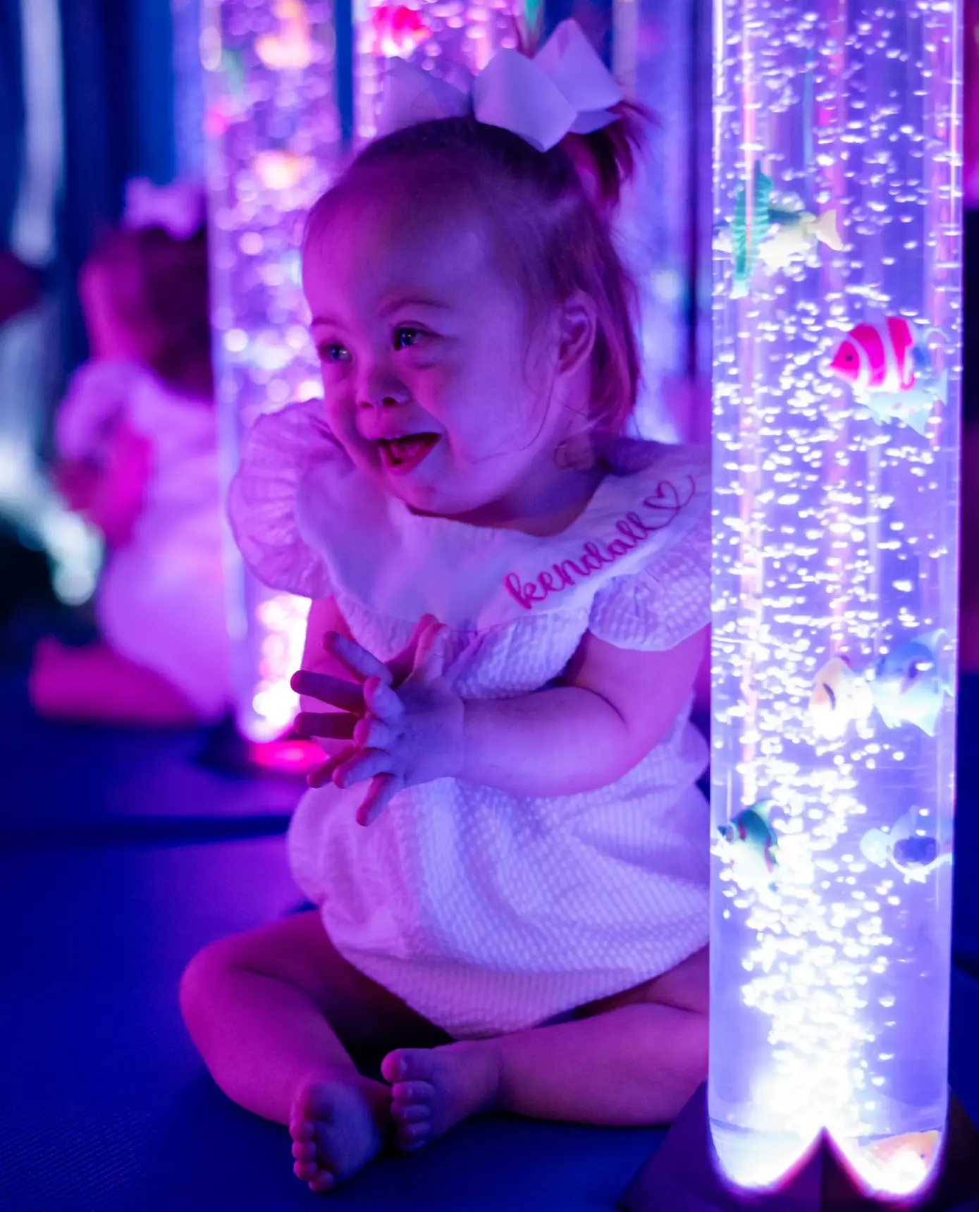 ABP 2024-47 - Sensory Room baby baby laughing in sensory room at Down to Play